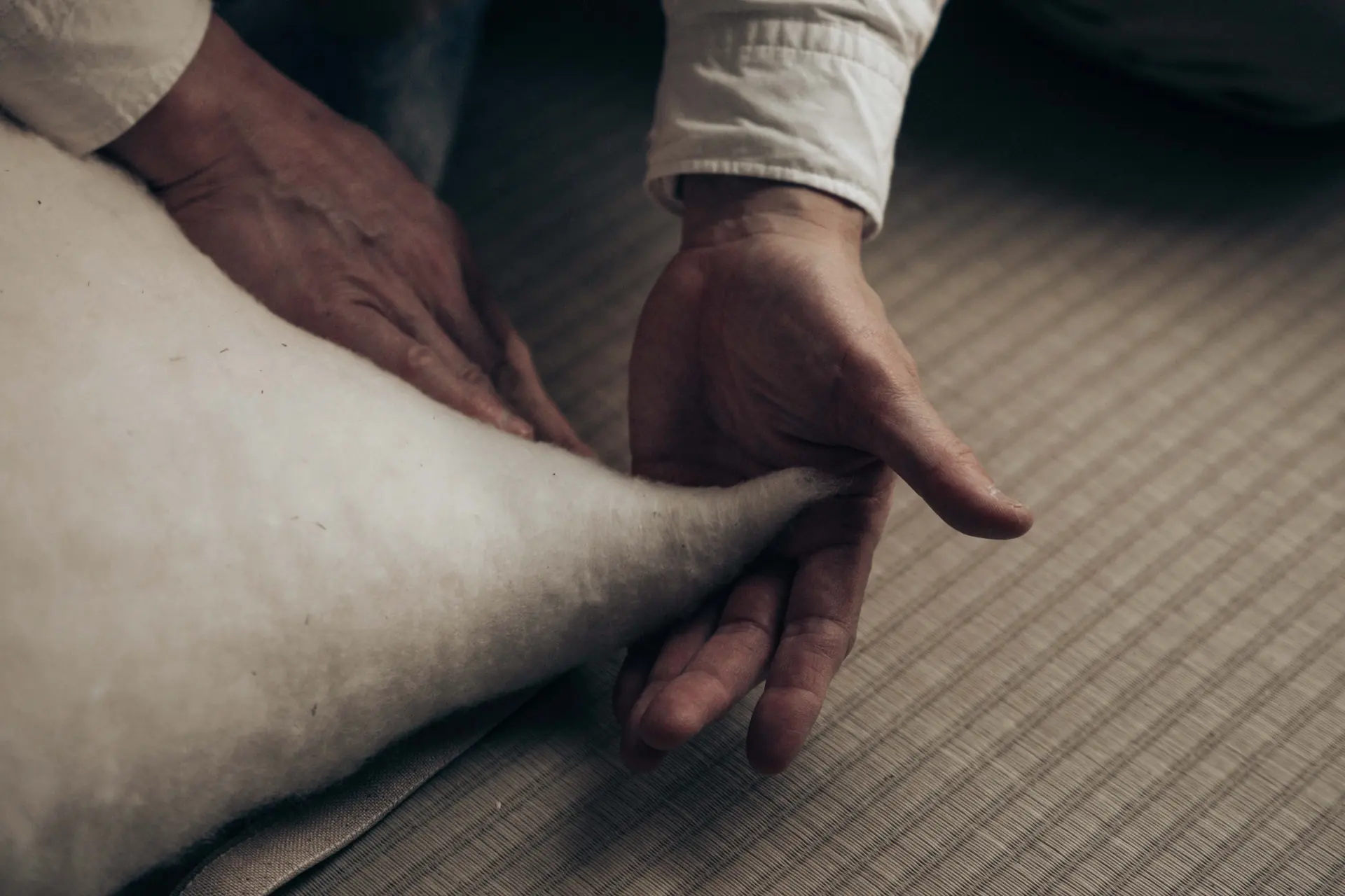 Layering cotton by hand